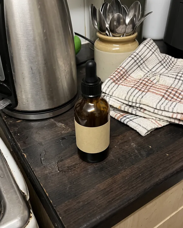 The product as the owner photographed it: a serum bottle on a kitchen worktop.
